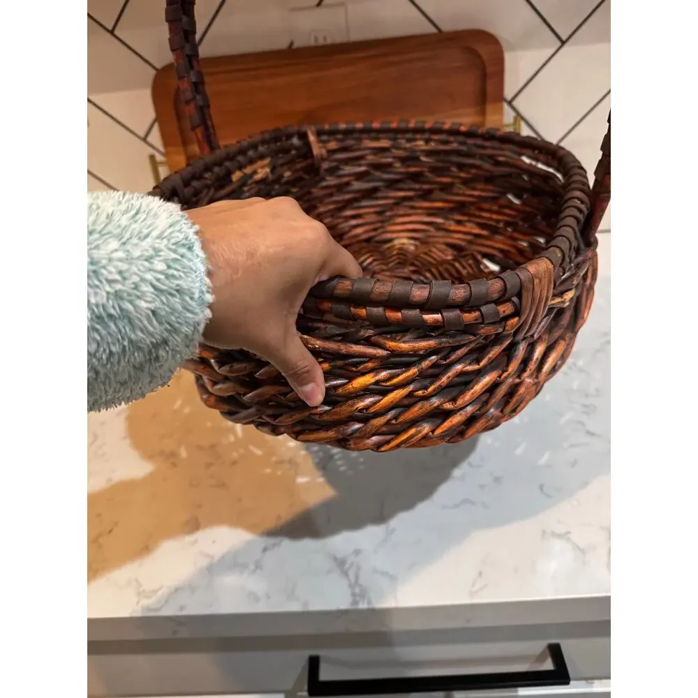 dark stained willow basket rustic handwoven texture sturdy center handle vintage